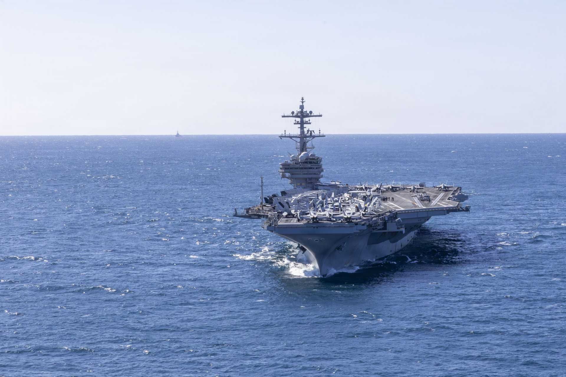 The USS George H.W. Bush is a Nimitz-class aircraft carrier commissioned in 2009, with a displacement of approximately 102,000 tons, a length of 333 meters, and a propulsion system based on two nuclear reactors generating sufficient power for speeds exceeding 30 knots. (Picture source: US Navy)