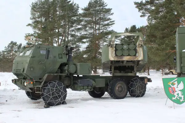 U.S. Army M142 HIMARS, a truck-mounted precision rocket system, fires GPS-guided GMLRS (and ATACMS-class missiles) from a sealed launch pod, delivering rapid shoot-and-scoot strikes at ranges from tens to hundreds of kilometers with digital fire control and fast reloads (Picture source: Army Recognition Group).