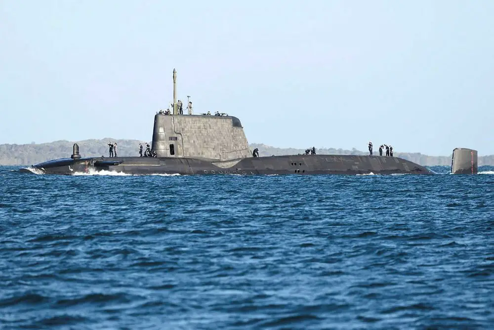 British Royal Navy Astute-class nuclear-powered attack submarine HMS Anson during operations at sea, representing the United Kingdom’s covert long-range strike and intelligence capability deployable toward the Middle East and within operational reach of Iran and the Strait of Hormuz.