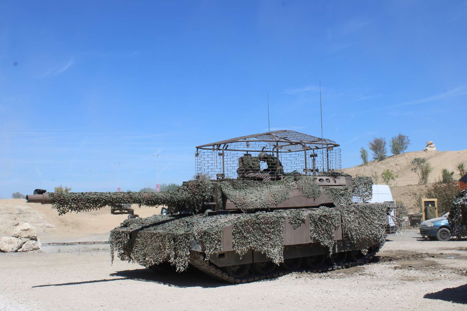 French Army Leclerc XLR main battle tank displayed at Eurosatory 2026 with a roof-mounted anti-drone cage, reflecting lessons from Ukraine and France’s push to improve armored vehicle survivability against FPV drones and loitering munitions (Picture source: Army Recognition Group).