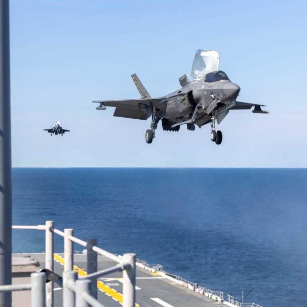 U.S. Marine Corps F-35B Lightning II executes a vertical landing on the flight deck of USS Kearsarge (LHD 3) during historic first flight operations in the Atlantic Ocean on February 10, 2026, marking the ship’s entry into fifth-generation expeditionary strike capability.