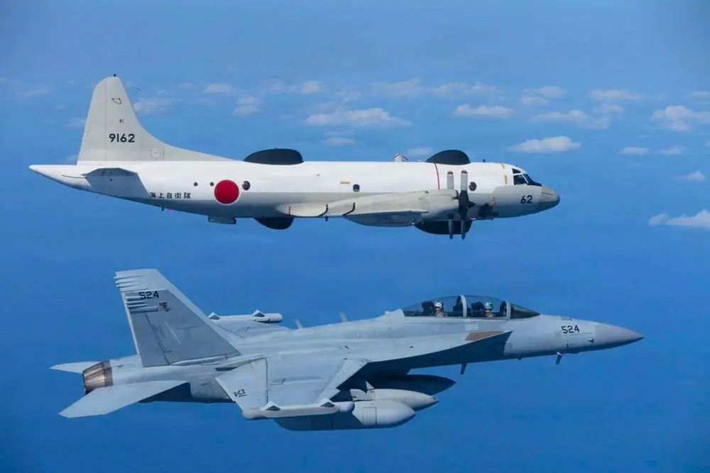 A U.S. Navy EA-18G Growler and JMSDF OP-3C conducted a bilateral flight on February 18, 2026, highlighting deepening U.S.-Japan integration of electronic warfare and surveillance capabilities in a contested Indo-Pacific environment (Picture Source: U.S. Navy)