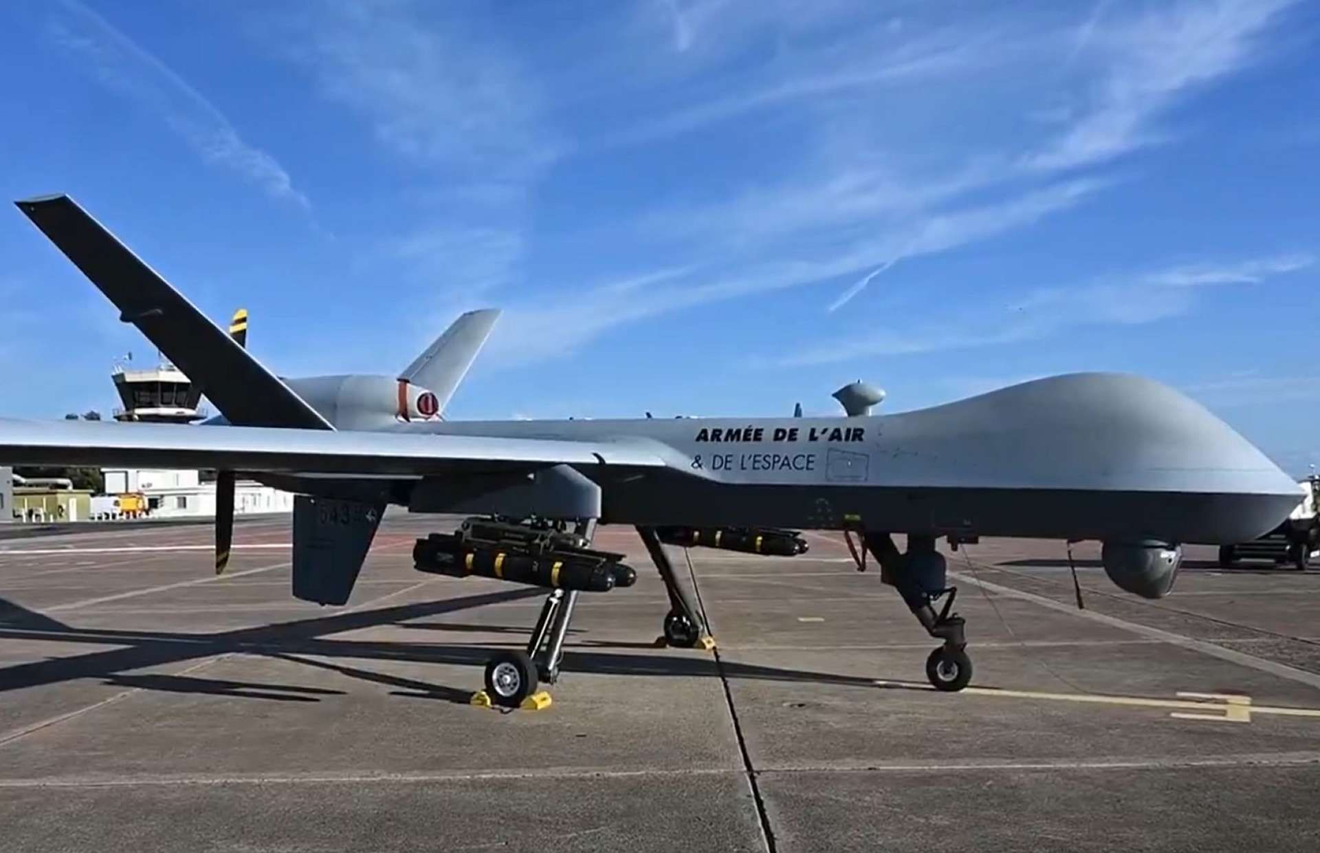 A French Air and Space Force MQ-9 Reaper conducts live-fire trials with AGM-114 Hellfire missiles and GBU-49 bombs, marking a major step in arming France’s U.S.-made drones while highlighting the tension between operational needs and European defense sovereignty (Picture source: French Air Force).