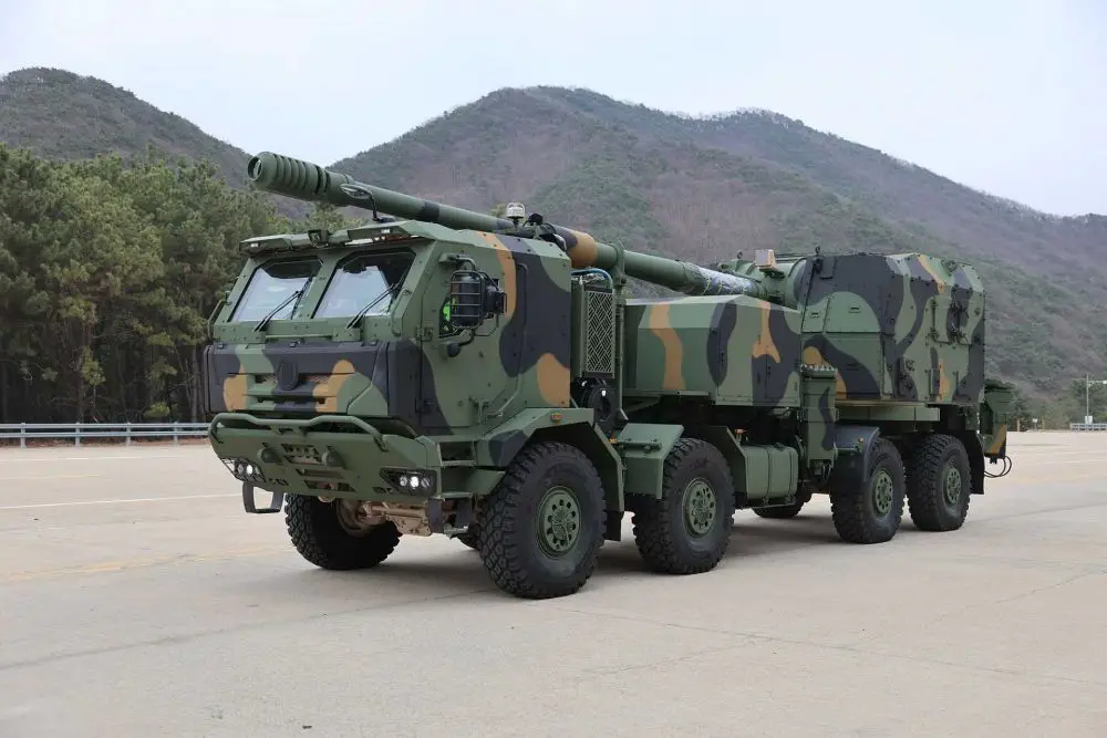 Hanwha Aerospace unveils new 8x8 wheeled self-propelled howitzer with K9 Thunder-derived 155 mm gun, combining long-range firepower with enhanced mobility and rapid deployment capability.