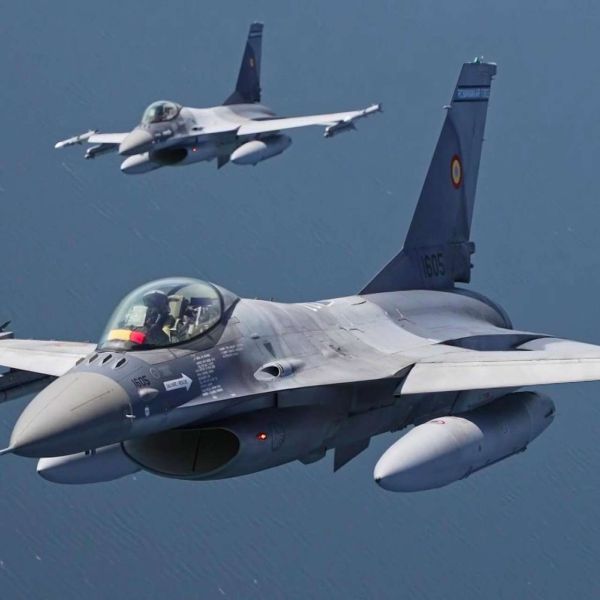Two Romanian Air Force F-16s fly above the Baltic Sea, modernized to NATO standards with advanced radar, avionics, and precision weapons for air policing and defense (Picture Source: NATO's Allied Air Command)