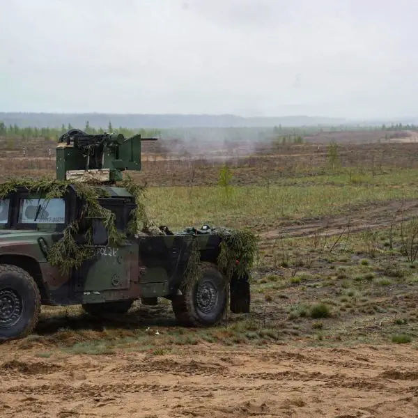 U.S. Army soldiers from the 5th Battalion, 4th Air Defense Artillery Regiment test a modified Humvee equipped with a CROWS remote weapon station and M2 Browning machine gun near Baltadvaris, Lithuania, on May 9, 2026. The improvised Mobile Fire Team vehicle, created by mounting a recycled CROWS turret onto a Humvee, provides a mobile low-cost counter-drone capability as part of NATO’s Eastern Flank Deterrence Initiative.