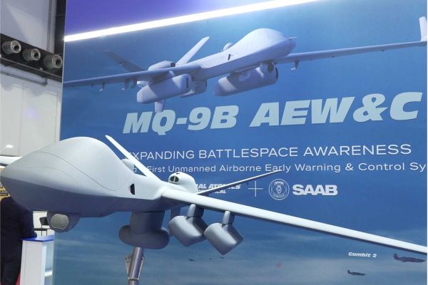 Scale model of the MQ-9B unmanned aircraft system configured for airborne early warning and control, showcased by General Atomics and Saab at BEDEX 2026, highlighting the expansion of UAV roles into battlespace management and networked operations.