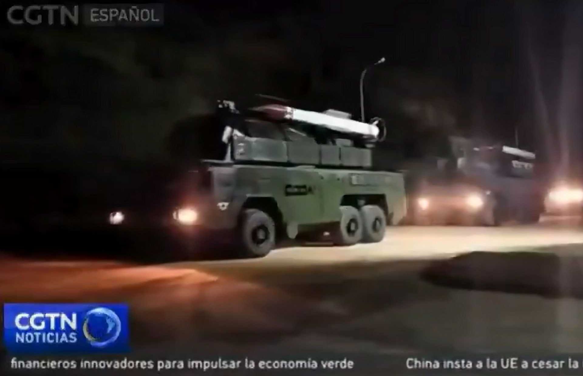 Venezuelan Buk-M2E surface-to-air missile system deployed west of Caracas, Venezuela. Image captured from local media footage showing the movement of launcher vehicles and radar units on October 25, 2025, indicating full combat readiness. (Picture source: Venezuela TV)