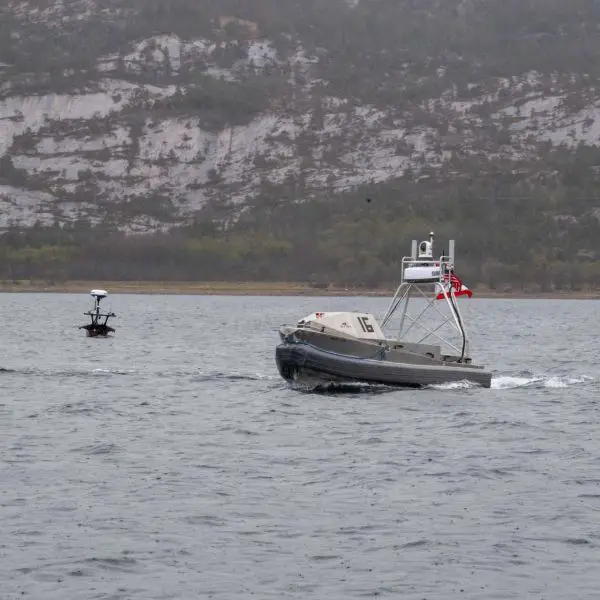 A Global Autonomous Reconnaissance Craft assigned to Commander, Task Force 66 operates in Breivika Bay during Arctic Sentry 2026, supporting U.S.-Norwegian unmanned maritime operations in the High North.