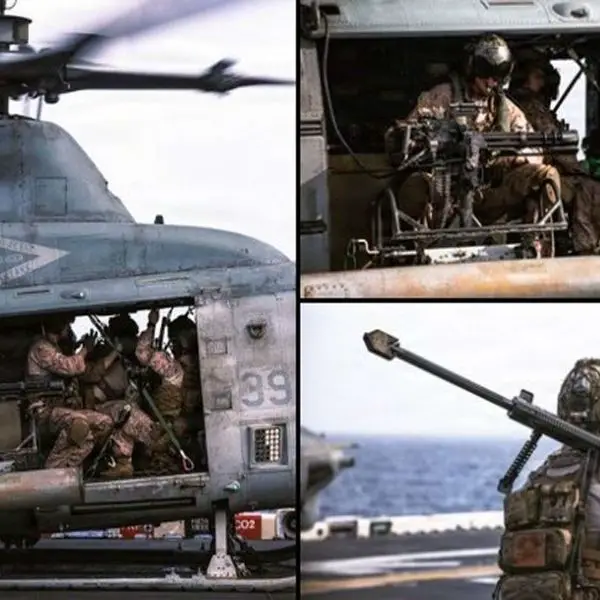 U.S. Marines with the 31st Marine Expeditionary Unit conduct aerial sniper and close air support training from a UH-1Y Venom aboard USS Tripoli in the CENTCOM area, combining precision rifle fire, crew-served weapons, and ship-based aviation procedures for maritime overwatch and force protection (Picture source: U.S. DoW).