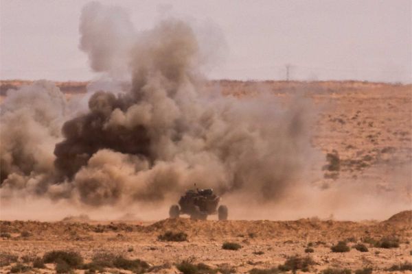 An unmanned ground vehicle supports a live counterattack exercise during African Lion 26 at Cap Draa, Morocco, on May 4, 2026, as U.S. Army and Moroccan forces tested autonomous battlefield systems, robotic warfare tactics, and combined arms operations designed to reduce soldier exposure in future combat.