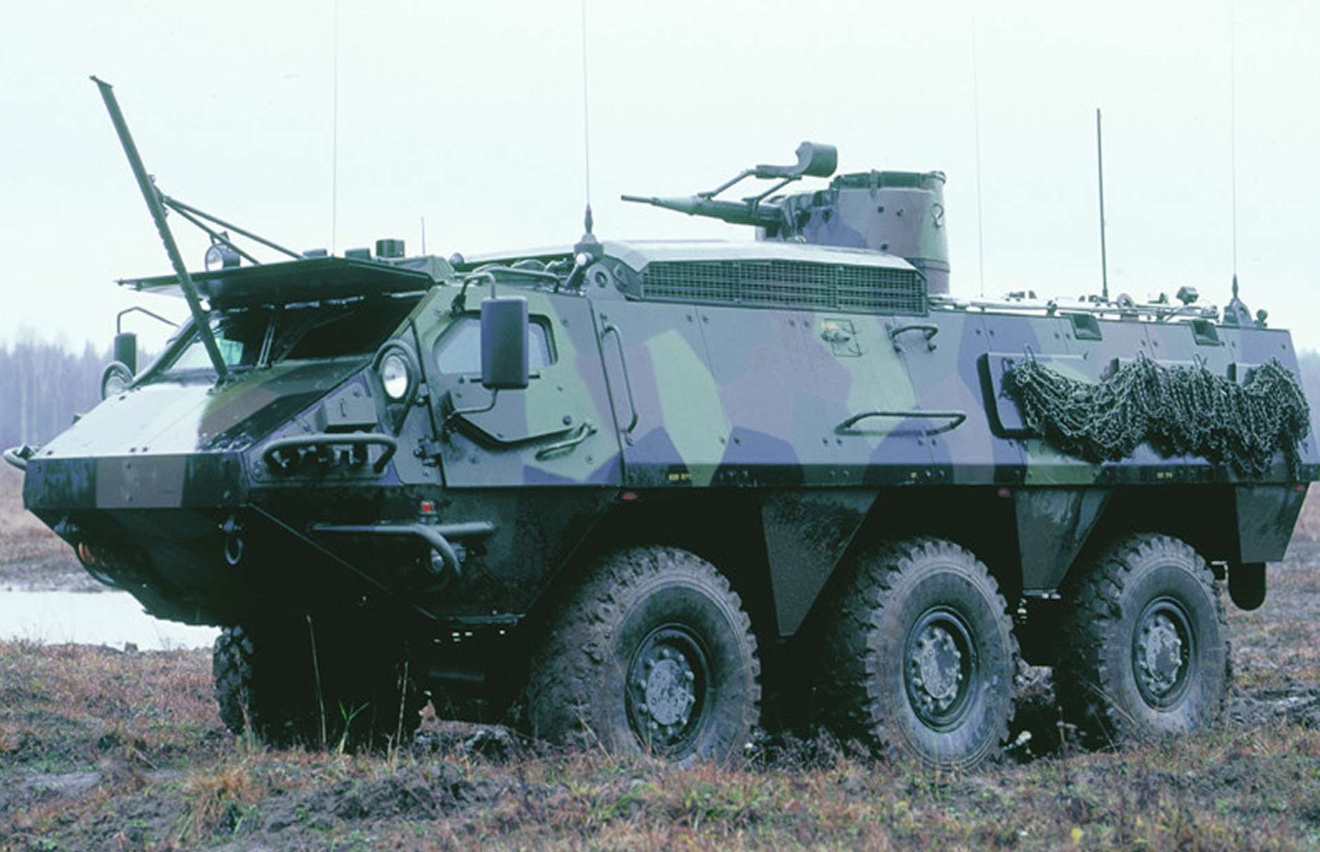 Sweden has ordered upgrades for 58 Patgb 203 armoured 6x6 vehicles, introducing remote weapon station readiness to extend their service life and improve crew protection, fire control, and operational effectiveness as a bridge capability while newer Patgb 300 vehicles are delivered (Picture source: Patria).