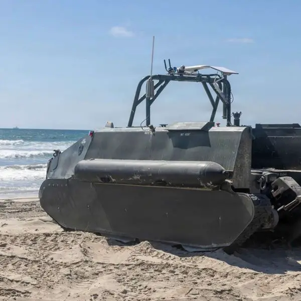 Unmanned tracked amphibious craft for surf zone operations, using swarming and remote control to detect, mark, and report mines, opening safer beach lanes for Marines( Picture source: U.S. DoW).