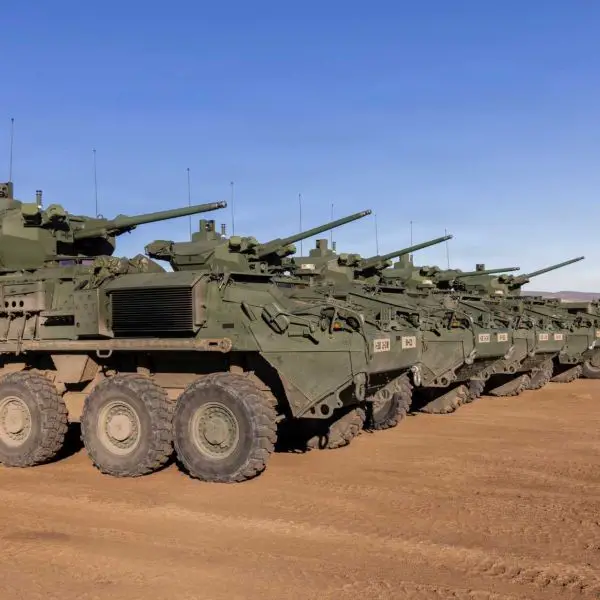 New M1126 Stryker combat vehicles equipped with 30mm automatic cannons, assigned to 2nd Battalion, 3rd Infantry Regiment, 1-2 Stryker Brigade Combat Team, line up in preparation for the next live-fire iteration at Yakima Training Center, Washington, December 13, 2025.