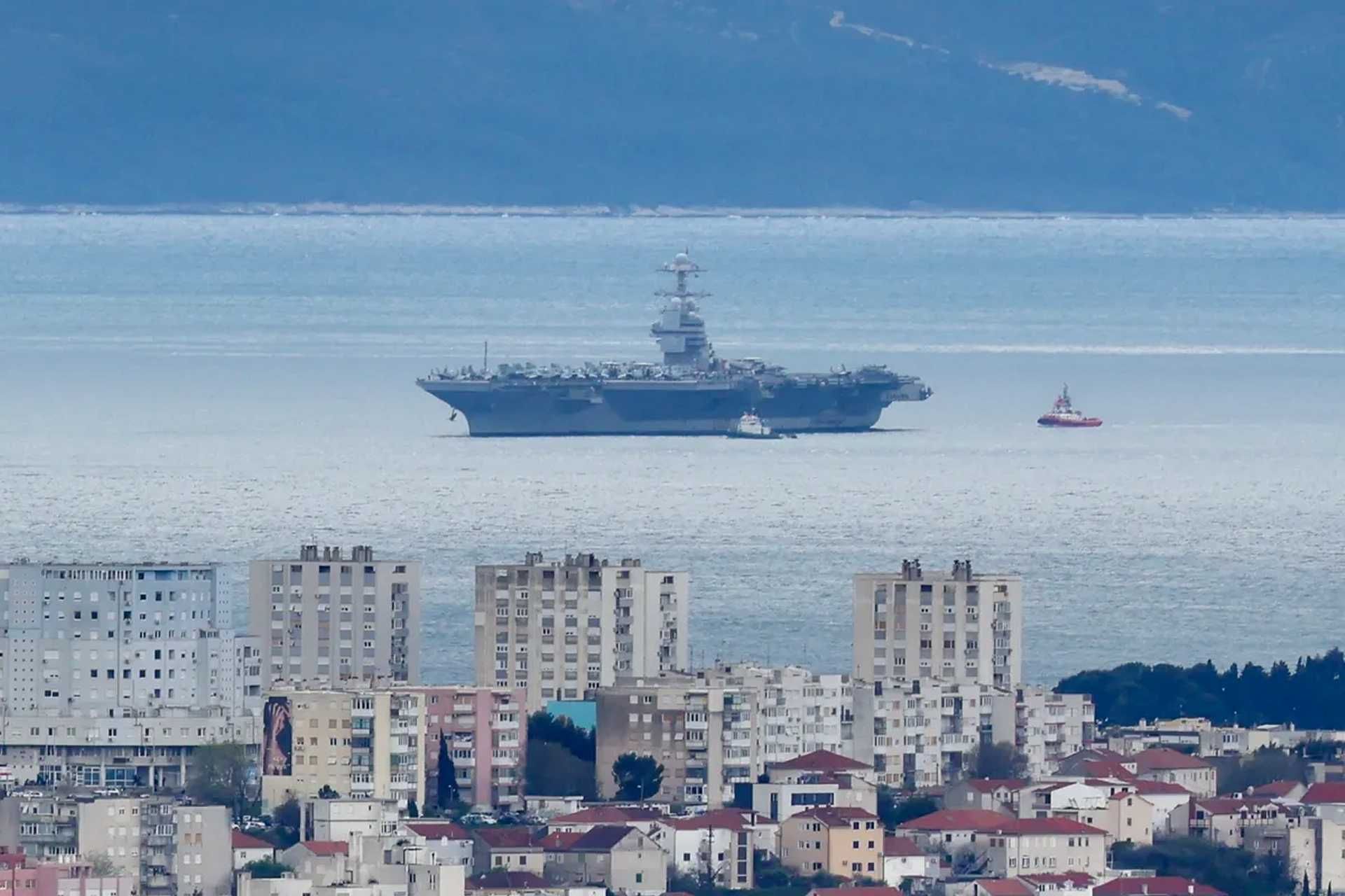 Following initial repair assessments in Souda Bay, Crete, the USS Gerald R. Ford relocated to Croatia to continue maintenance tasks with support from Carrier Strike Group Twelve and regional technical teams. (Picture source: Twitter/NationalIndNews)