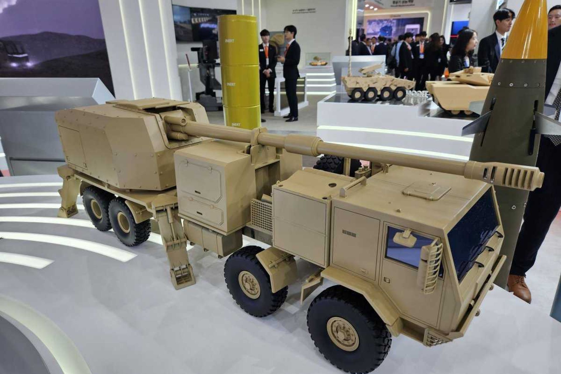 Hanwha Aerospace unveils new 8x8 wheeled self-propelled howitzer with K9 Thunder-derived 155 mm gun, combining long-range firepower with enhanced mobility and rapid deployment capability.