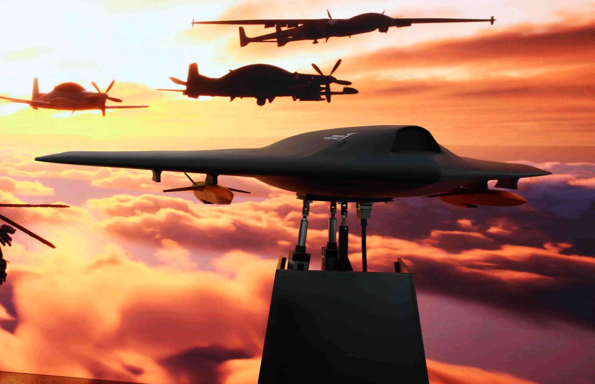 TAI ANKA III stealth UCAV on display at World Defense Show, a flying-wing strike and ISR drone designed for manned-unmanned teaming, featuring internal weapons carriage for low-observable precision attacks, high-altitude endurance, and networked targeting in contested airspace (Picture source: Army Recognition Group).