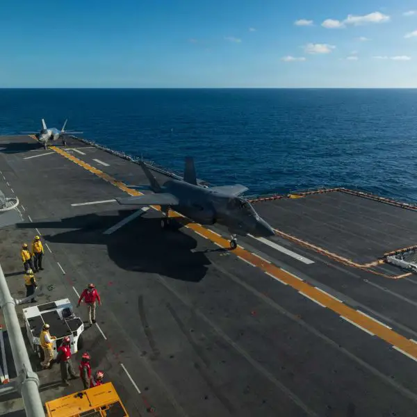 U.S. Marine Corps F-35B Lightning II fighter jets from Marine Fighter Attack Squadron 122 (VMFA-122), assigned to the 11th Marine Expeditionary Unit, are positioned on the flight deck of the Wasp-class amphibious assault ship USS Boxer (LHD 4) during operations in the Pacific Ocean on December 5, 2025.