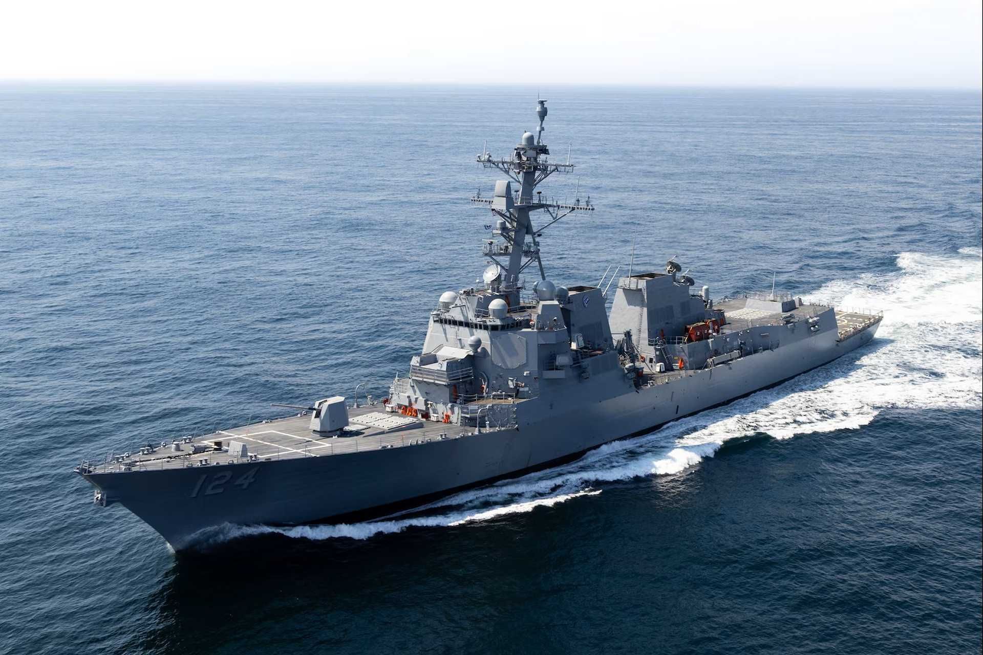 The future U.S. Navy USS Harvey C. Barnum Jr. (DDG 124), a Flight IIA Technology Insertion Arleigh Burke-class destroyer, underway during acceptance trials prior to delivery to the U.S. Navy, showcasing its Aegis combat system radar arrays and advanced multi-mission configuration.
