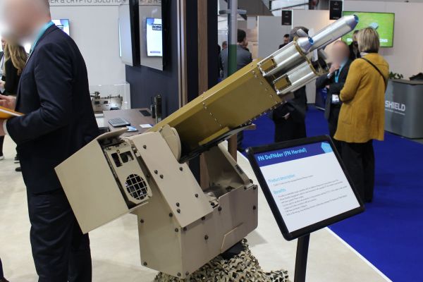 FN Herstal and Thales Belgium display the FN DeFNder Medium+ Remote Weapon Station fitted with a FZ605 five-tube 70 mm rocket launcher at BEDEX 2026 in Brussels (Picture source: Army Recognition)