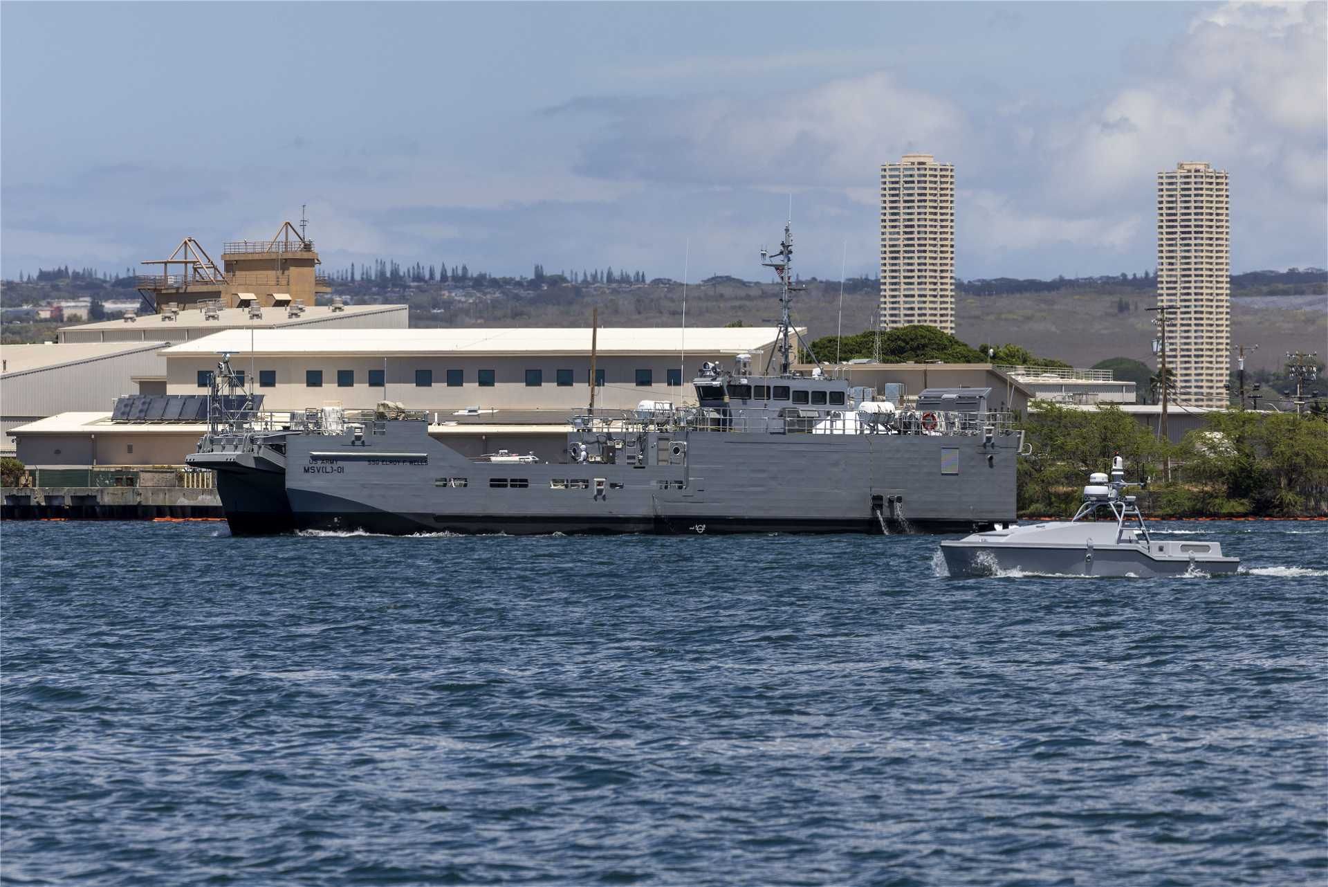 U.S. Army Maneuver Support Vessel (Light) (MSV-L) prototype during operational evaluation, highlighting its role as a next-generation shallow-draft landing craft designed to replace legacy LCM-8 vessels and enable rapid transport of up to 82 tons (74.4 tonnes) of vehicles, equipment, and medical support across austere littoral environments.