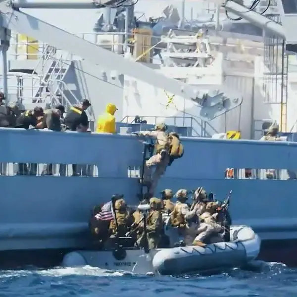 U.S. Marines assigned to the Maritime Special Purpose Force of the 22nd Marine Expeditionary Unit conduct maritime interdiction training while underway in the Caribbean Sea, rehearsing ship boarding procedures from rigid-hulled inflatable boats.