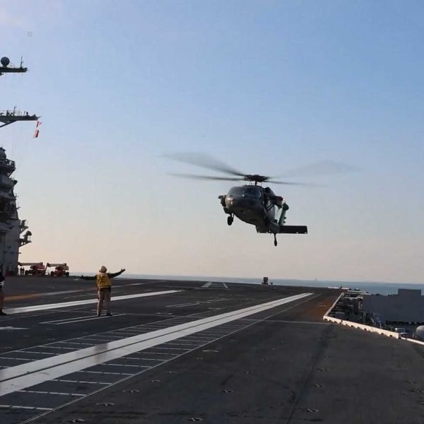 MH-60S Knighthawk from HSC-7 “Dusty Dogs” lands on the flight deck of Pre-Commissioning Unit USS John F. Kennedy (CVN 79) during Builder’s Trials, January 28, 2026, marking the first aircraft touchdown on the Navy’s second Ford-class aircraft carrier.