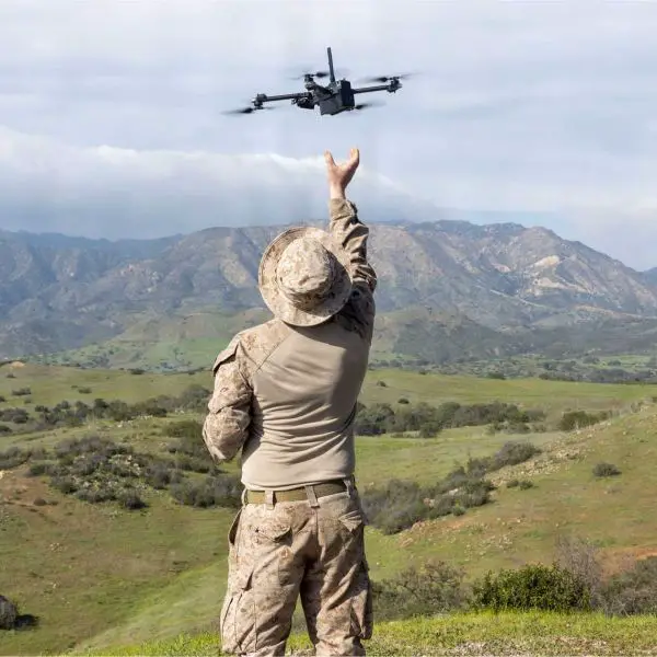 U.S. Marines Corps Sgt. Jason Hamm, a small unmanned aircraft systems operator assigned to 1st Marine Division Schools, prepares to recover a Neros Archer first-person view attack drone following a live-fire iteration during the Small Attack Drone Operators Course at Marine Corps Base Camp Pendleton, California, on January 23, 2026.