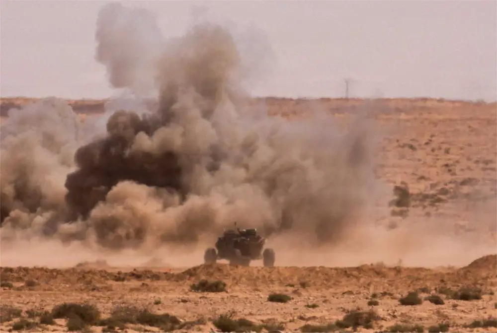 An unmanned ground vehicle supports a live counterattack exercise during African Lion 26 at Cap Draa, Morocco, on May 4, 2026, as U.S. Army and Moroccan forces tested autonomous battlefield systems, robotic warfare tactics, and combined arms operations designed to reduce soldier exposure in future combat.