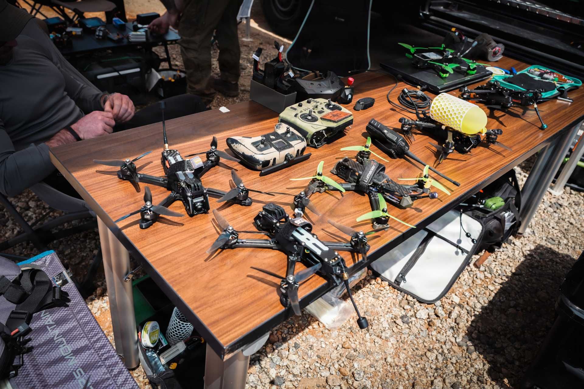Operators from the U.S. Army's 1st Special Forces Command (Airborne) prepare unmanned aerial vehicle control equipment ahead of a counter-drone demonstration in Ellerbe, North Carolina, on May 5, 2026. The exercise showcased emerging technologies and tactics designed to detect, track, and defeat hostile unmanned aerial threats in operational environments.
