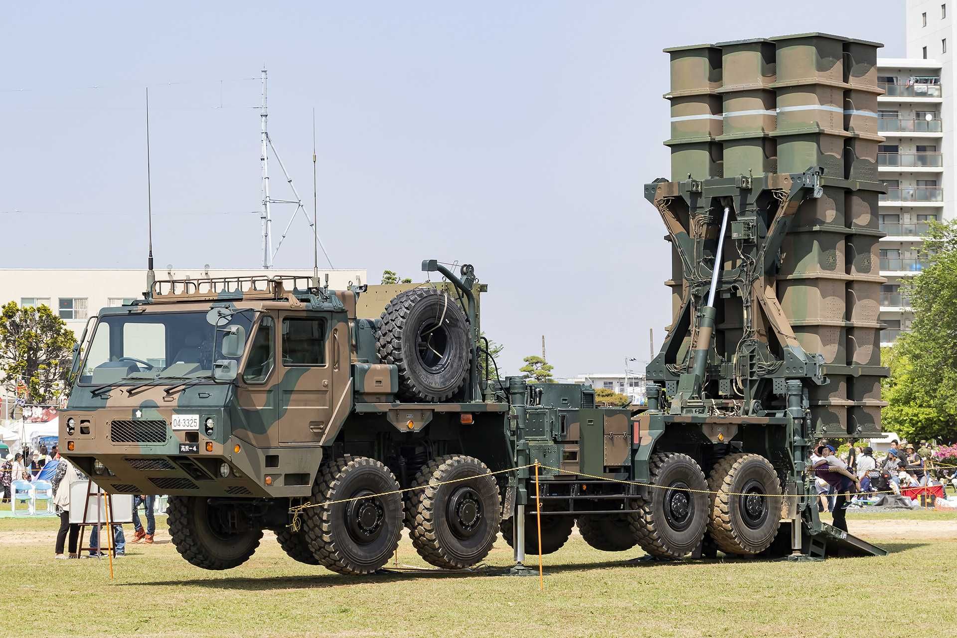 A Japan Ground Self-Defense Force Type-03 surface-to-air missile system during a live-fire drill. The system is set to undergo major upgrades under a new Ministry of Defense program aimed at countering ballistic and hypersonic missile threats.