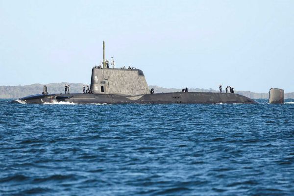 British Royal Navy Astute-class nuclear-powered attack submarine HMS Anson during operations at sea, representing the United Kingdom’s covert long-range strike and intelligence capability deployable toward the Middle East and within operational reach of Iran and the Strait of Hormuz.