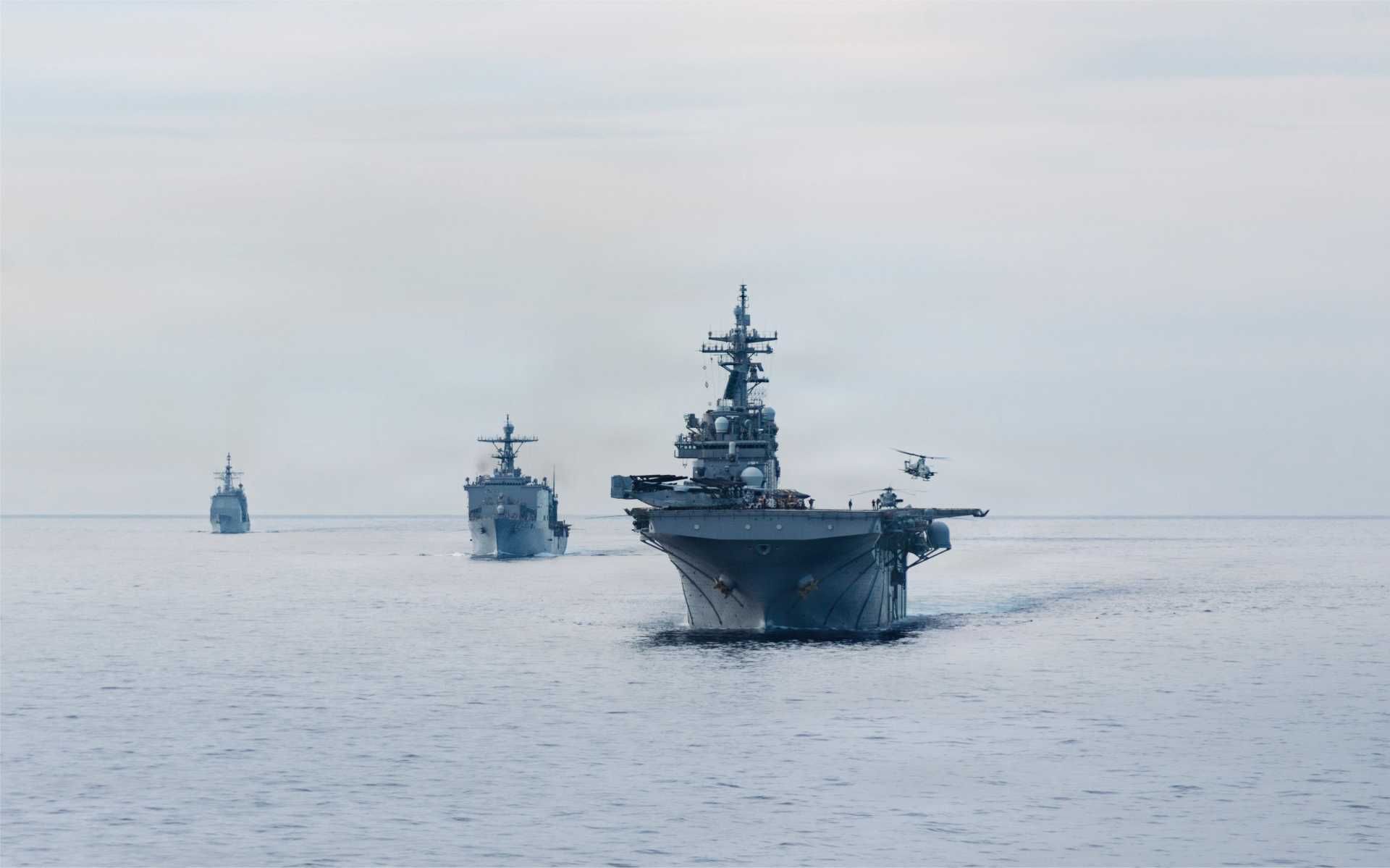 The Boxer Amphibious Ready Group, escorted by the Ticonderoga-class guided-missile cruiser USS Princeton (CG-59), executes a simulated strait transit in the Pacific Ocean on January 27, 2026. The maneuver strengthened Navy-Marine Corps integration and force protection procedures as the 11th Marine Expeditionary Unit conducted high-end integrated training operations in the U.S. 3rd Fleet area of responsibility.