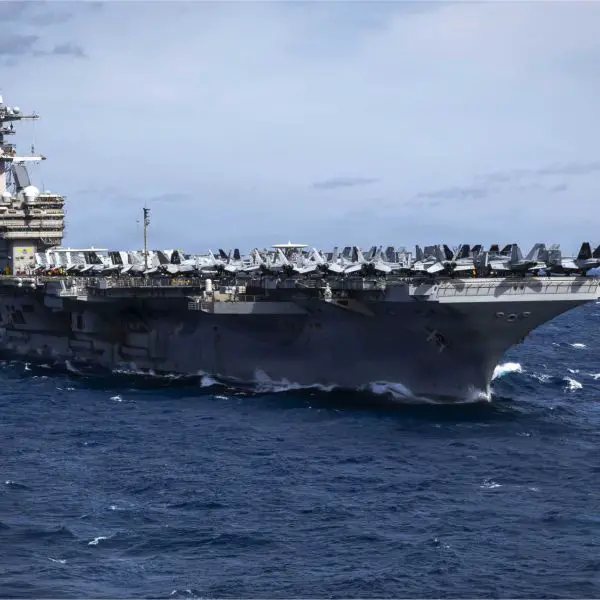 USS George H.W. Bush (CVN-77), a Nimitz-class nuclear-powered aircraft carrier of the U.S. Navy, sails during operations at sea. The carrier is preparing for potential deployment to the Middle East as part of a Carrier Strike Group reinforcing U.S. naval presence near Iran.