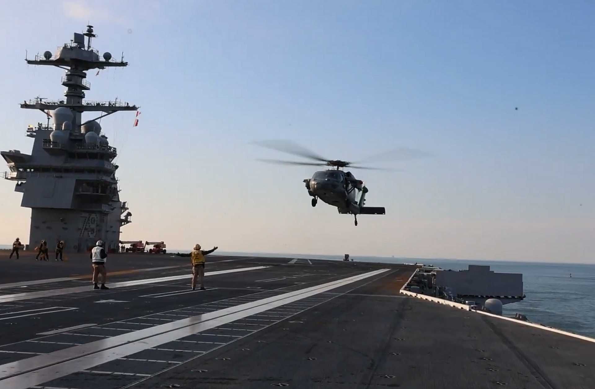 MH-60S Knighthawk from HSC-7 “Dusty Dogs” lands on the flight deck of Pre-Commissioning Unit USS John F. Kennedy (CVN 79) during Builder’s Trials, January 28, 2026, marking the first aircraft touchdown on the Navy’s second Ford-class aircraft carrier.