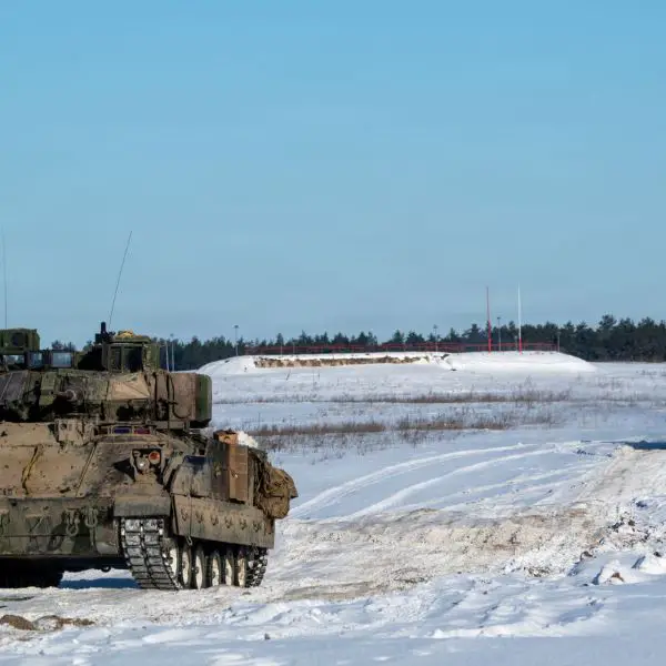 U.S. Soldiers from 3rd Battalion, 8th Cavalry Regiment lead a formation of M2A3 Bradley Fighting Vehicles during a live-fire exercise at Bemowo Piskie Training Area, Poland, on Jan. 31, 2026.